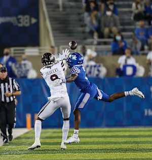 Former Kentucky cornerback Cedrick Dort breaks up a pass against Mississippi State.